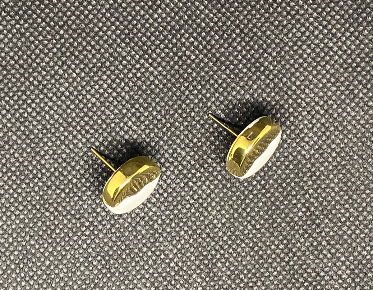 Orecchini in ceramica rotondi bianco con onda oro
